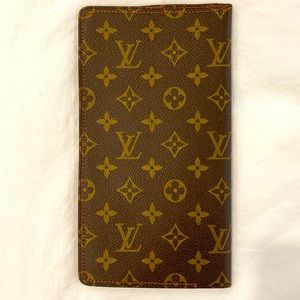 Vintage Louis Vuitton wallet.  9.5” x 5.5”